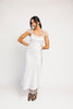 a white satin midi dress with lace detailing + a fitted silhouette. the perfect short sleeve occasion dress for weddings, bridal showers, + dinner parties.
