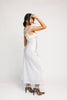 a white satin midi dress with lace detailing + a fitted silhouette. the perfect short sleeve occasion dress for weddings, bridal showers, + dinner parties.

