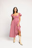 vintage-inspired puff sleeve dress with a square neckline. the perfect red gingham puff sleeve dress for rodeos, family pictures,+ semi-casual occasions.
