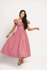 vintage-inspired puff sleeve dress with a square neckline. the perfect red gingham puff sleeve dress for rodeos, family pictures,+ semi-casual occasions.
