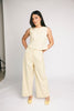 butter yellow pant set with a cropped button up tank + high waisted trousers. the perfect elevated set for the office + everyday wear. 
