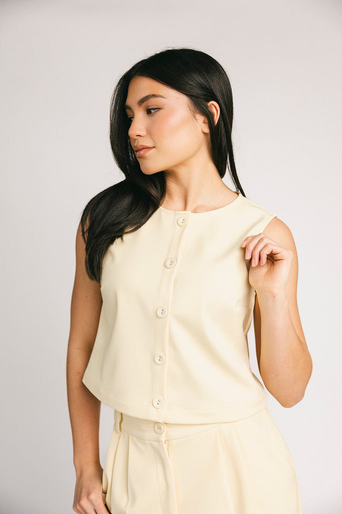 butter yellow pant set with a cropped button up tank + high waisted trousers. the perfect elevated set for the office + everyday wear. 
