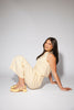 butter yellow pant set with a cropped button up tank + high waisted trousers. the perfect elevated set for the office + everyday wear. 
