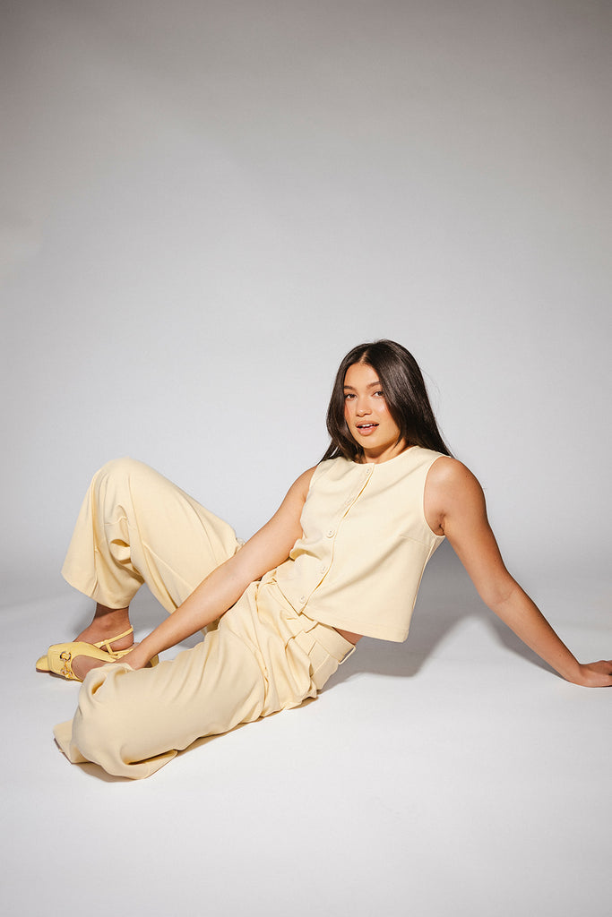 butter yellow pant set with a cropped button up tank + high waisted trousers. the perfect elevated set for the office + everyday wear. 
