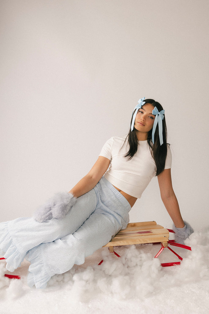 a classic plain white baby tee with a slightly cropped silhouette. the perfect fitted white t-shirt for everyday wear + casual outfit styling.
