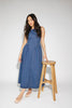 a vintage-inspired denim dress with a boat neckline + a v-shaped waistline. the perfect denim midi dress for family pictures, brunch dates, + special occasions. 
