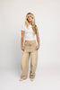 low rise wide leg denim with a folded waistband + distressed details. the perfect y2k-inspired bottoms for date nights + casual wear. 
