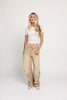 low rise wide leg denim with a folded waistband + distressed details. the perfect y2k-inspired bottoms for date nights + casual wear. 
