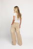 low rise wide leg denim with a folded waistband + distressed details. the perfect y2k-inspired bottoms for date nights + casual wear. 
