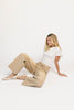 low rise wide leg denim with a folded waistband + distressed details. the perfect y2k-inspired bottoms for date nights + casual wear. 
