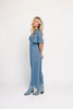a blue polka dot maxi dress with flutter sleeves + a front tie detail. the perfect short sleeve polka dot dress for brunch dates, baby showers, + semi-formal occasions.

