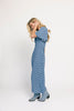 a blue polka dot maxi dress with flutter sleeves + a front tie detail. the perfect short sleeve polka dot dress for brunch dates, baby showers, + semi-formal occasions.
