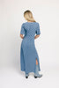 a blue polka dot maxi dress with flutter sleeves + a front tie detail. the perfect short sleeve polka dot dress for brunch dates, baby showers, + semi-formal occasions.
