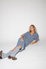 a blue polka dot maxi dress with flutter sleeves + a front tie detail. the perfect short sleeve polka dot dress for brunch dates, baby showers, + semi-formal occasions.
