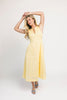 a classic yellow midi dress with a fitted bodice + a v waistline. the perfect vintage-inspired yellow dress for weddings, bridal showers, + garden parties.
