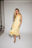 a classic yellow midi dress with a fitted bodice + a v waistline. the perfect vintage-inspired yellow dress for weddings, bridal showers, + garden parties.
