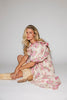 a pink floral puff sleeve dress with a ruffle neckline. the perfect vintage-inspired dress for baby showers, family pictures, + special occasions.
