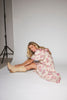 a pink floral puff sleeve dress with a ruffle neckline. the perfect vintage-inspired dress for baby showers, family pictures, + special occasions.

