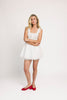 a white tank with a babydoll style silhouette + eyelet details. pair it with the matching white shorts to create the perfect two piece set for brunch dates, vacations, + everyday wear. 