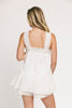 a white tank with a babydoll style silhouette + eyelet details. pair it with the matching white shorts to create the perfect two piece set for brunch dates, vacations, + everyday wear. 