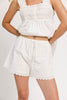 white cotton shorts with eyelet details. pair them with the matching white tank top to create the perfect two piece set for brunch dates, vacations, + everyday wear. 