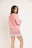 vintage inspired pink cardigan with toggle buttons and an open front. perfect for casual outfits and lightweight layering. 
