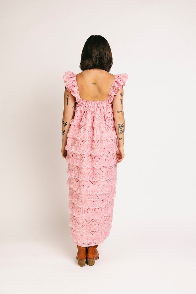 vintage inspired pink lace maxi dress with an elastic neckline and tiered ruffle details. perfect for weddings, bridal showers, and baby showers. 

