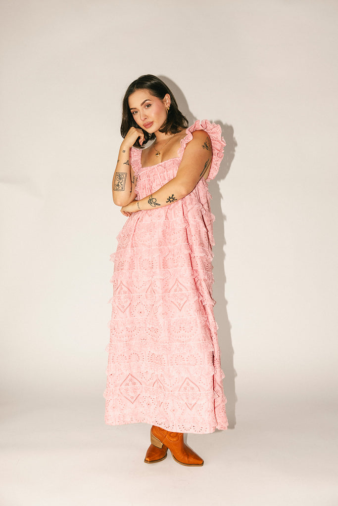 vintage inspired pink lace maxi dress with an elastic neckline and tiered ruffle details. perfect for weddings, bridal showers, and baby showers. 
