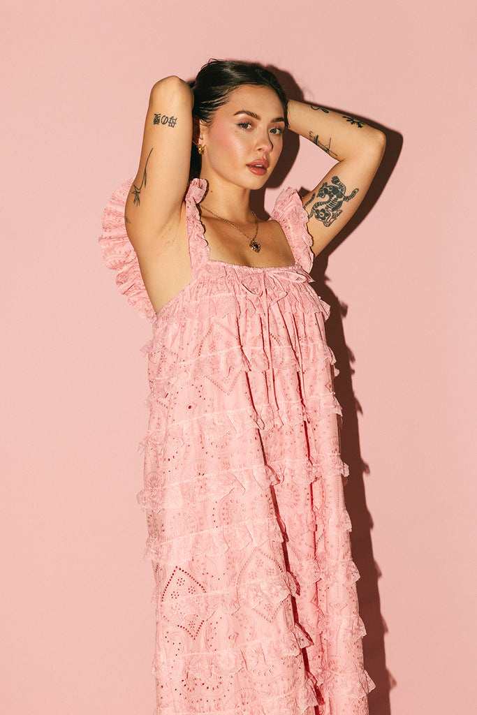 vintage inspired pink lace maxi dress with an elastic neckline and tiered ruffle details. perfect for weddings, bridal showers, and baby showers. 
