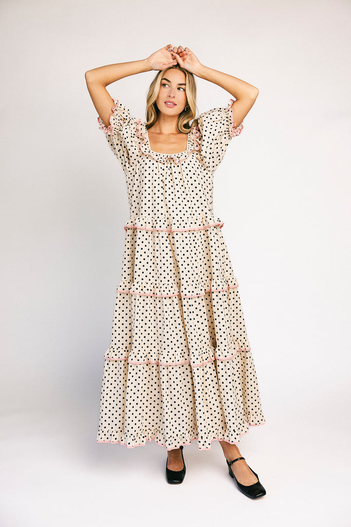 zoco daymaker dress: puff sleeve polka dot dress with an elastic neckline and pink trim details. perfect for weddings, baby showers, and family pictures.