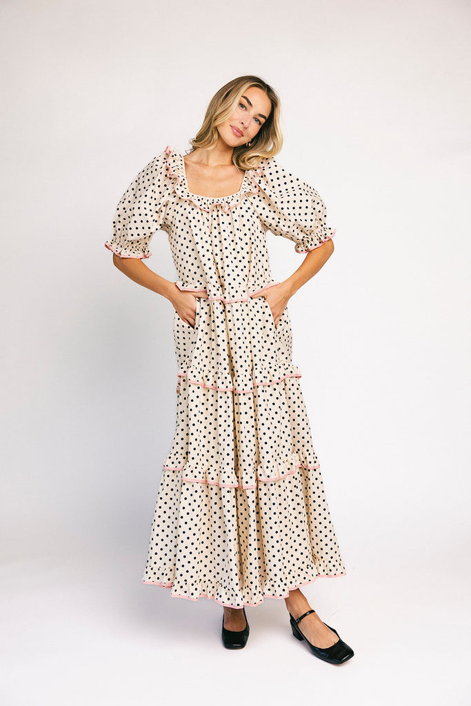 zoco daymaker dress: puff sleeve polka dot dress with an elastic neckline and pink trim details. perfect for weddings, baby showers, and family pictures.