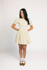 a floral puff sleeve dress with a smocked bodice + mini length. the perfect ditsy floral dress for family pictures, bridal showers, + brunch dates.