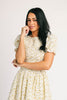 a floral puff sleeve dress with a smocked bodice + mini length. the perfect ditsy floral dress for family pictures, bridal showers, + brunch dates.