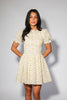 a floral puff sleeve dress with a smocked bodice + mini length. the perfect ditsy floral dress for family pictures, bridal showers, + brunch dates.