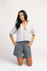 a vintage-inspired short sleeve white top with a relaxed fit + lace trim collar. the perfect elevated basic to dress up or down for any spring + summer outfit idea.