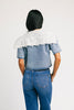 a short sleeve denim top with an oversized lace collar + a cropped silhouette. the perfect button up denim top to dress up or down for any outfit idea.
