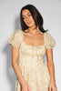 vintage-inspired puff sleeve dress with a muted yellow floral pattern. the perfect puff sleeve midi dress for weddings, bridal showers, + semi-formal events.
