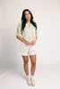 a vintage-inspired puff sleeve top with a pastel green pinstripe pattern + an oversized lace trim collar. the perfect elevated button up top for the office, dressy date nights, + everyday wear.
