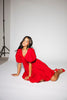 zoco daymaker dress: a short puff sleeve dress with an elastic neckline. the perfect red cotton dress for family pictures, weddings, and baby showers.
