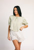 a vintage-inspired puff sleeve top with a pastel green pinstripe pattern + an oversized lace trim collar. the perfect elevated button up top for the office, dressy date nights, + everyday wear.
