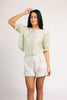 a vintage-inspired puff sleeve top with a pastel green pinstripe pattern + an oversized lace trim collar. the perfect elevated button up top for the office, dressy date nights, + everyday wear.
