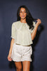 a vintage-inspired puff sleeve top with a pastel green pinstripe pattern + an oversized lace trim collar. the perfect elevated button up top for the office, dressy date nights, + everyday wear.
