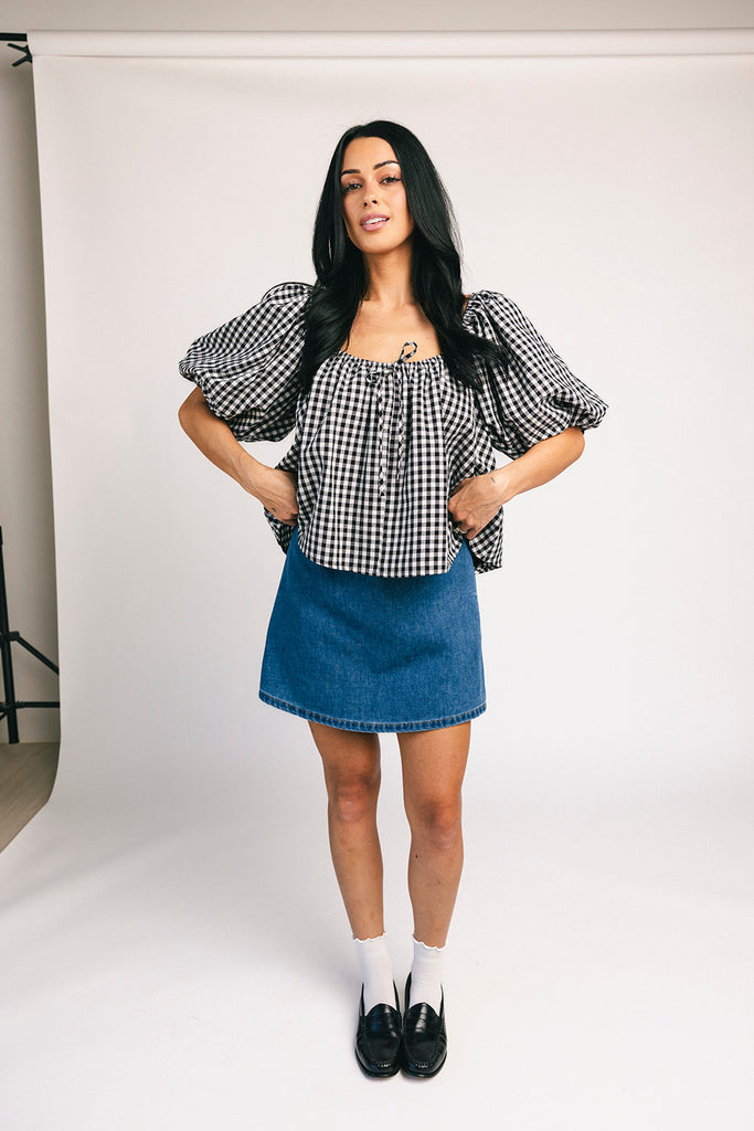black and white gingham puff sleeve top with an elastic neckline + bow detail. the perfect elevated basic top for date nights + casual outfits. 