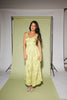 a flowy v-waist green dress with a sleek scoop neckline + subtle floral print. the perfect vintage-inspired maxi dress for weddings, bridal showers, + garden parties.
