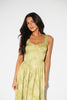 a flowy v-waist green dress with a sleek scoop neckline + subtle floral print. the perfect vintage-inspired maxi dress for weddings, bridal showers, + garden parties.

