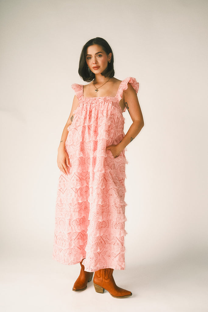 vintage inspired pink lace maxi dress with an elastic neckline and tiered ruffle details. perfect for weddings, bridal showers, and baby showers. 
