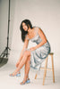 a light blue silk midi dress with lace detailing + a fitted silhouette. the perfect short sleeve occasion dress for weddings, bridal showers, + dinner parties.
