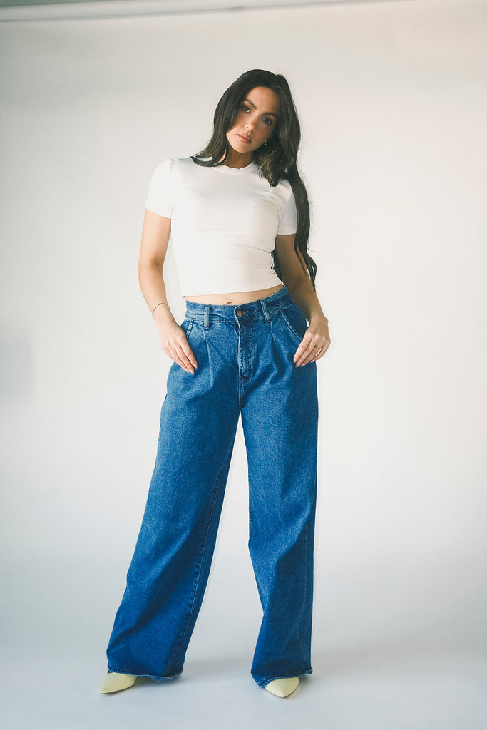 a classic plain white baby tee with a slightly cropped silhouette. the perfect fitted white t-shirt for everyday wear + casual outfit styling.
