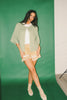 light green short sleeve cardigan with a slouchy, relaxed fit. perfect for casual outfits + lightweight layering.
