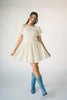 a floral puff sleeve dress with a smocked bodice + mini length. the perfect ditsy floral dress for family pictures, bridal showers, + brunch dates.